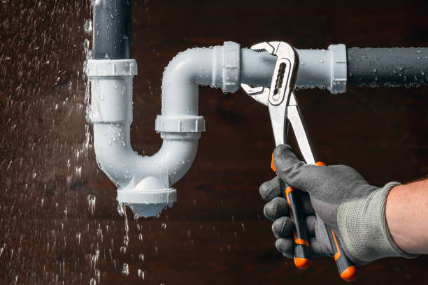 Professional Drain Cleaning technician working in Goodland, FL